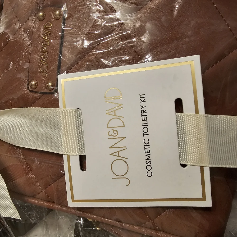Joan & David Two Piece Clear Cosmetic Bag Set with Two Travel Bottles